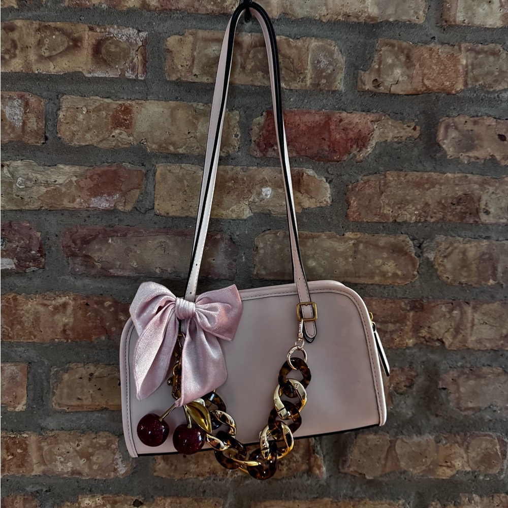 Elegant Pink Handbag with Chain Detail